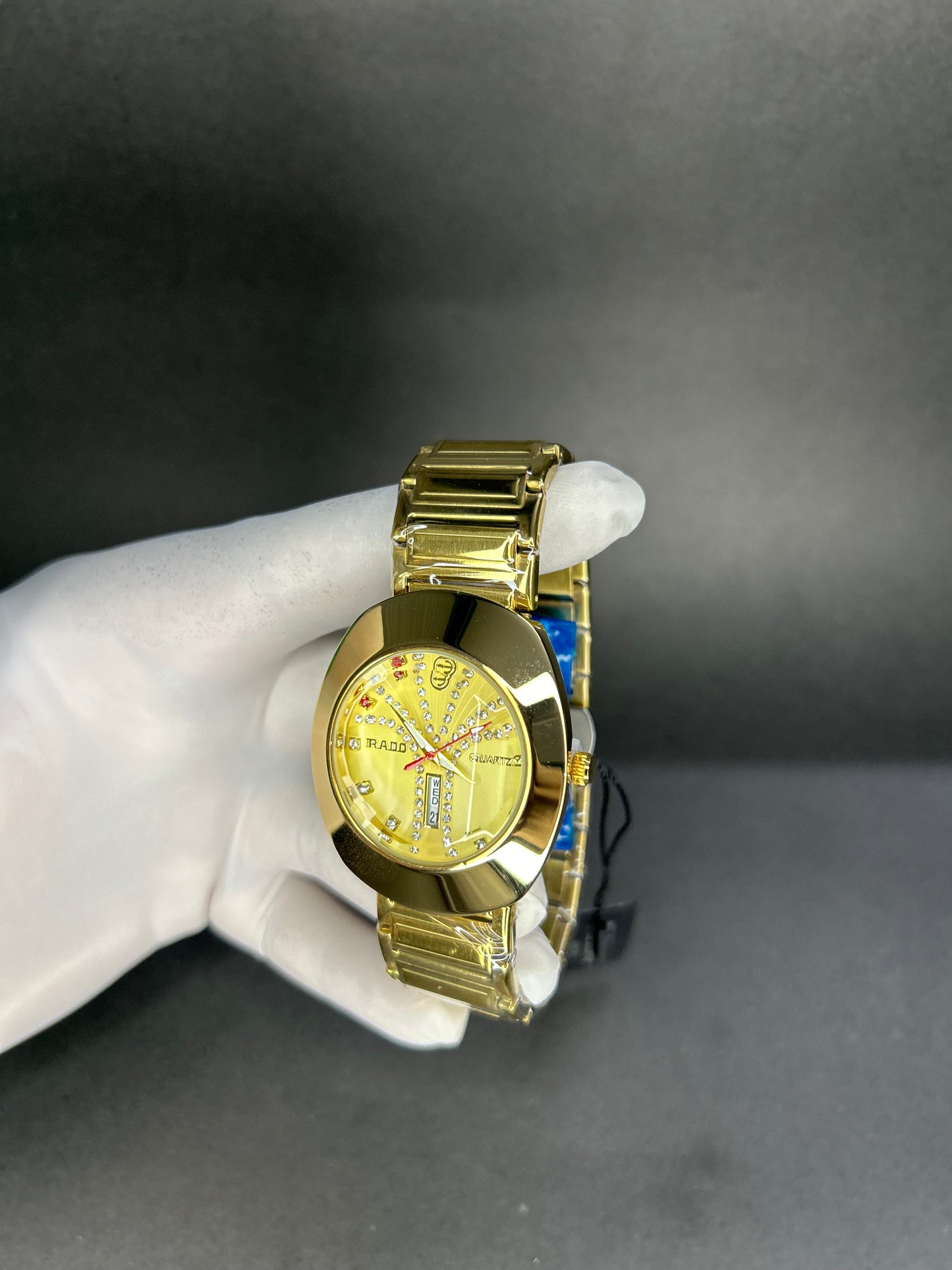 Rado with golden dial with date and day