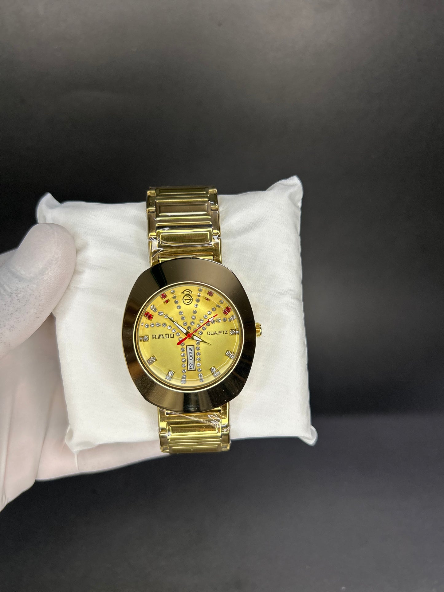 Rado with golden dial with date and day
