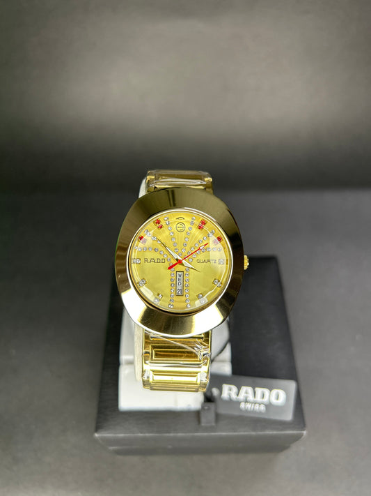 Rado with golden dial with date and day
