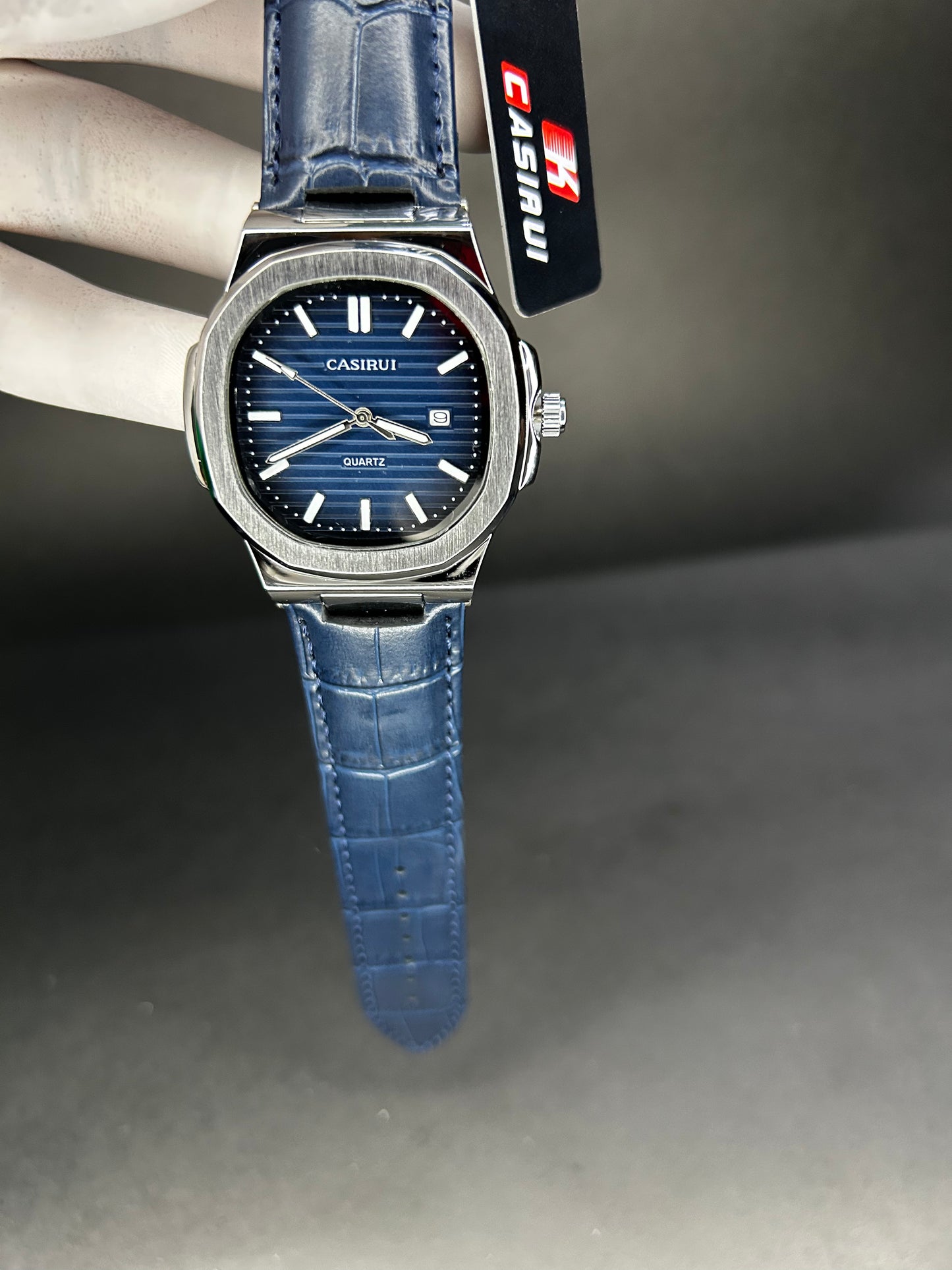 Quartz Casirui blue dial with textured blue strap and date